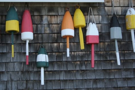 buoys on a building maine coast