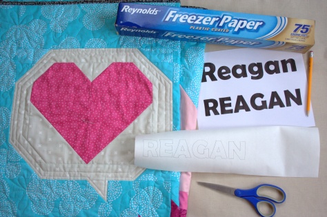 relief quilting of words in matchstick quilting with freezer paper