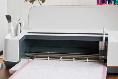 Cricut Maker in action drawing and cutting