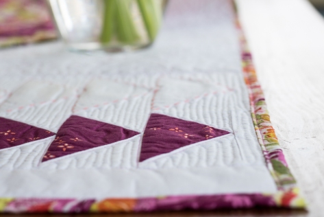 binding close up flying geese table runner